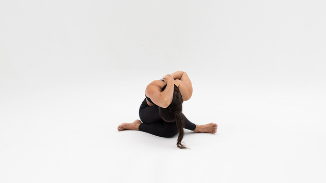 Briohny Smyth's "Cow Face Pose" Online Video Workouts on ALO Wellness Club